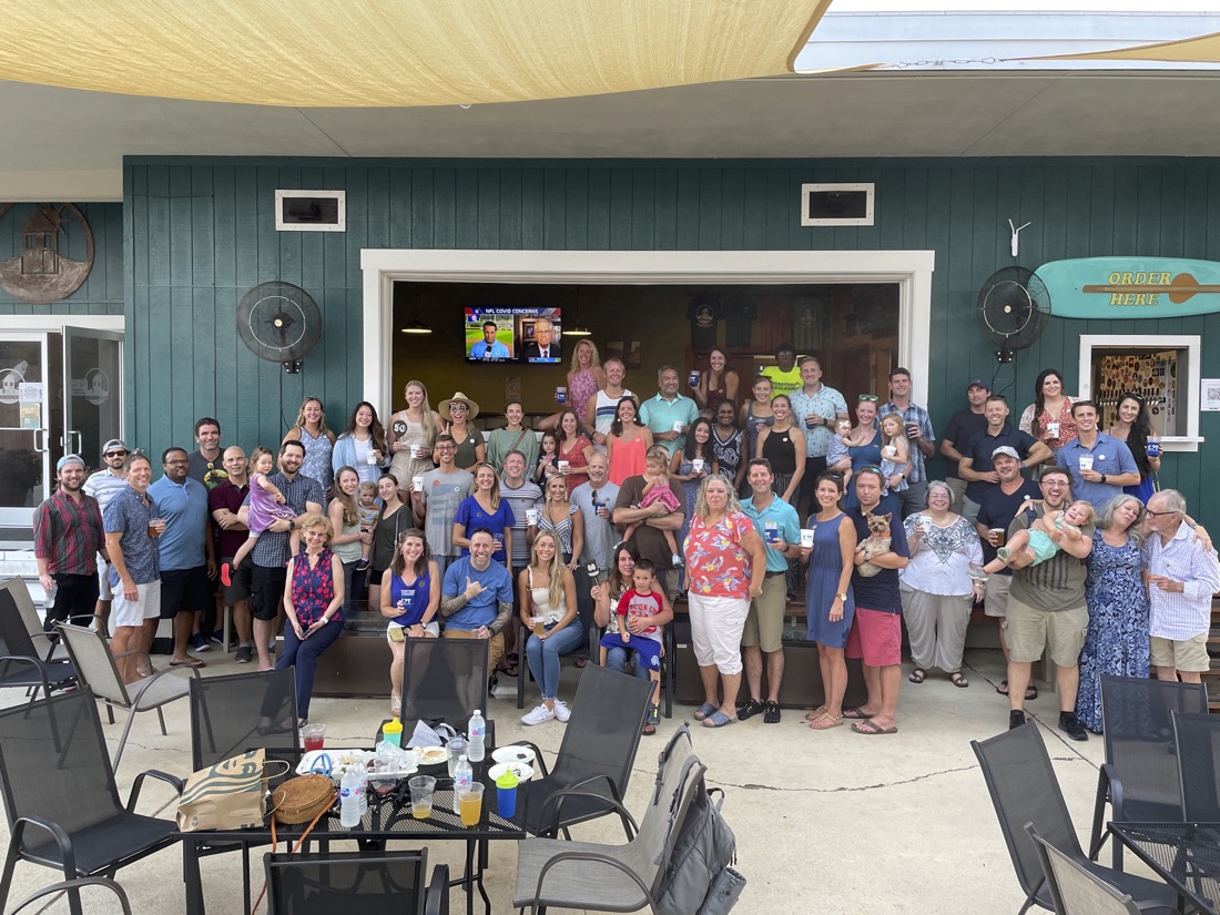 Photo of large group of people posing for the camera