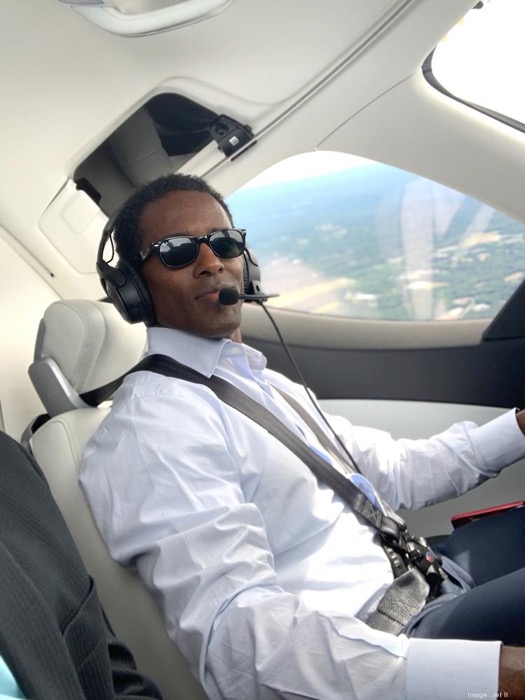 Man piloting an airplane.