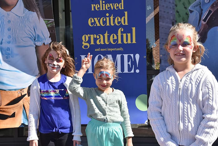 Kids celebrating at the opening of the ForKids Landmark Center